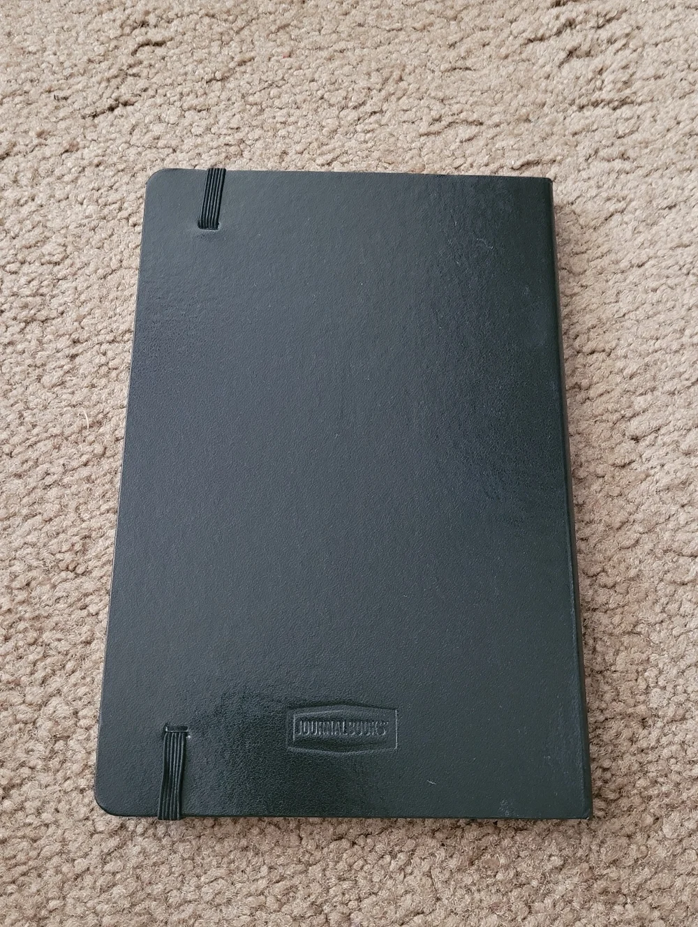 Varsity Spirit Black Embossed Elastic-Band Notebook